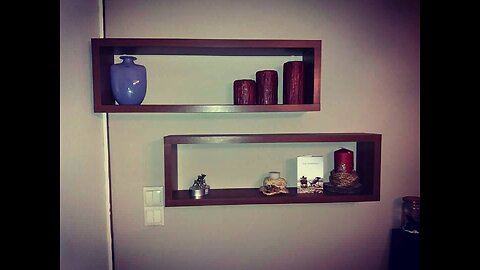 Wall design shelves with vase, ceriums and various handmade objects pieces