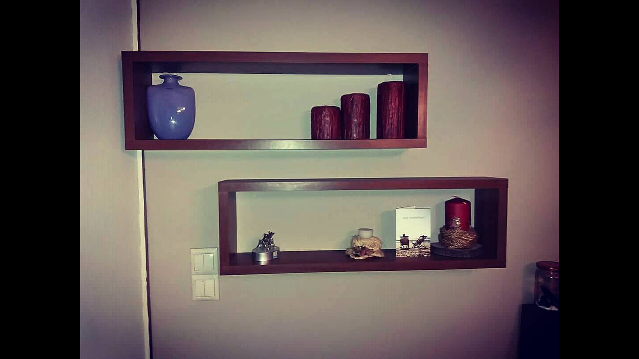 Wall design shelves with vase, ceriums and various handmade objects pieces