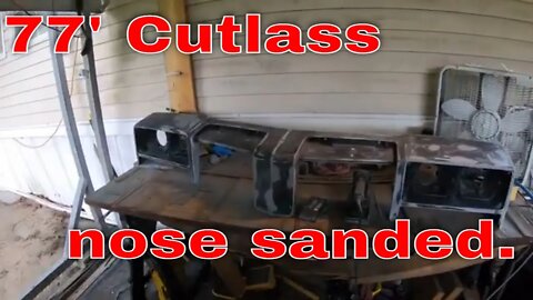 Clean and sand a 1977 Cutlass nose piece.