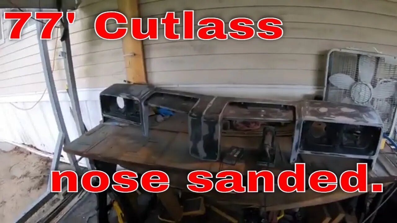 Clean and sand a 1977 Cutlass nose piece.