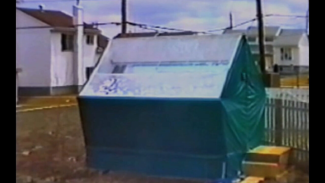 SolaRoof 1991: Richard Nelson explaining how soap bubble foam works in his backyard greenhouse