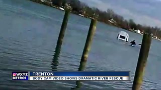 Police sergeant in kayak saves woman from sinking car in Detroit River