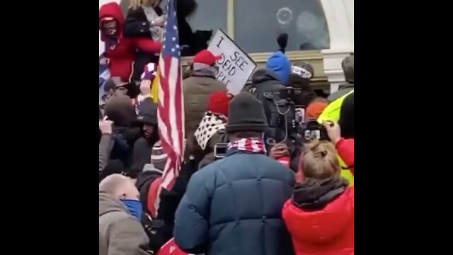 Trump supporters pulling dressed up antifa off the Capitol.