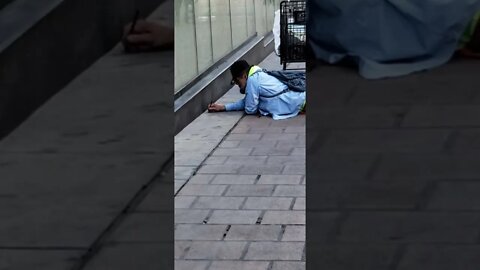 Guy Sleeping With Pants Down at Trolley Stop