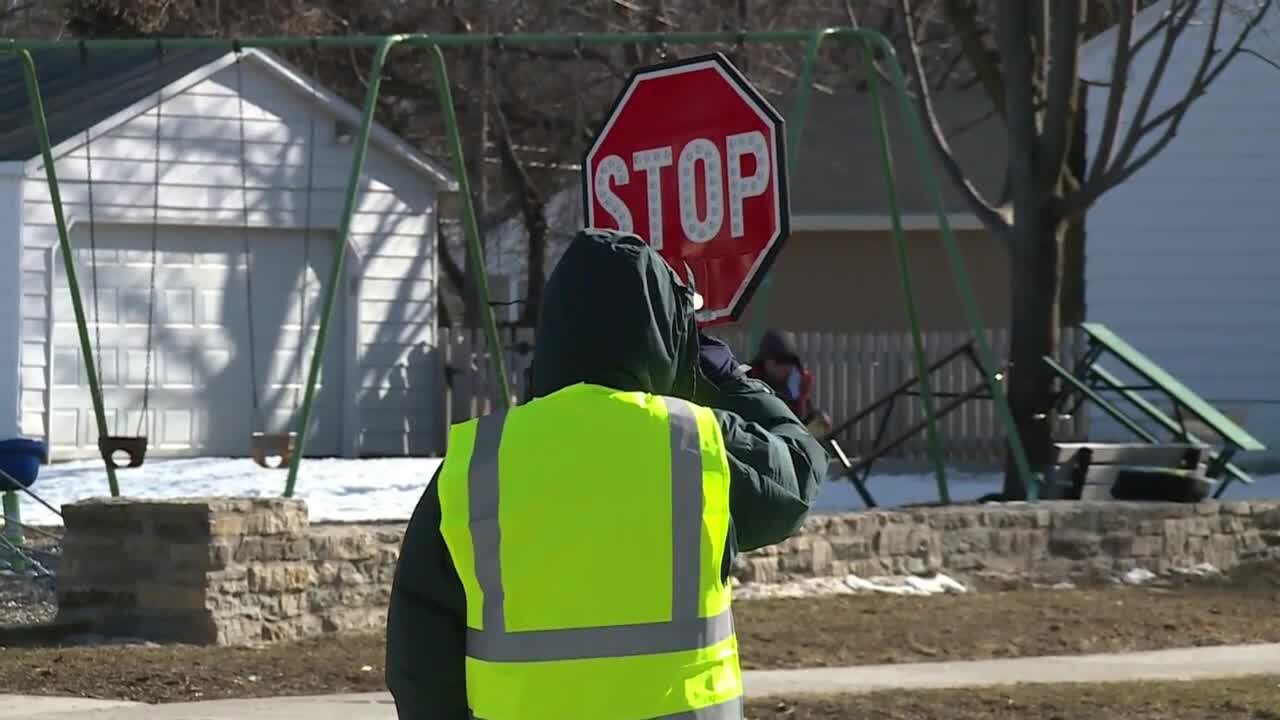 Police: Crossing guard job comes with vaccine eligibility