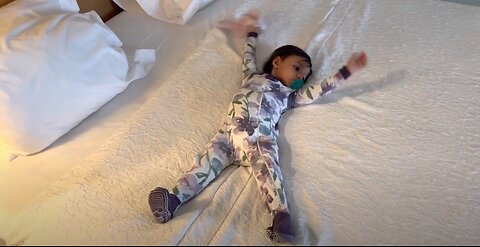 First Time in a Hotel; Immediately Makes “Bed Angels”.