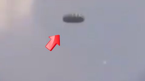 A saucer-shaped UFO and a small UFO trying to get inside a saucer-shaped UFO [Space]