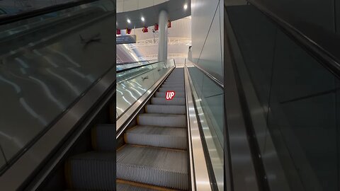 Up Escalator at Harry Reed international Airport, Las Vegas ￼D GATES