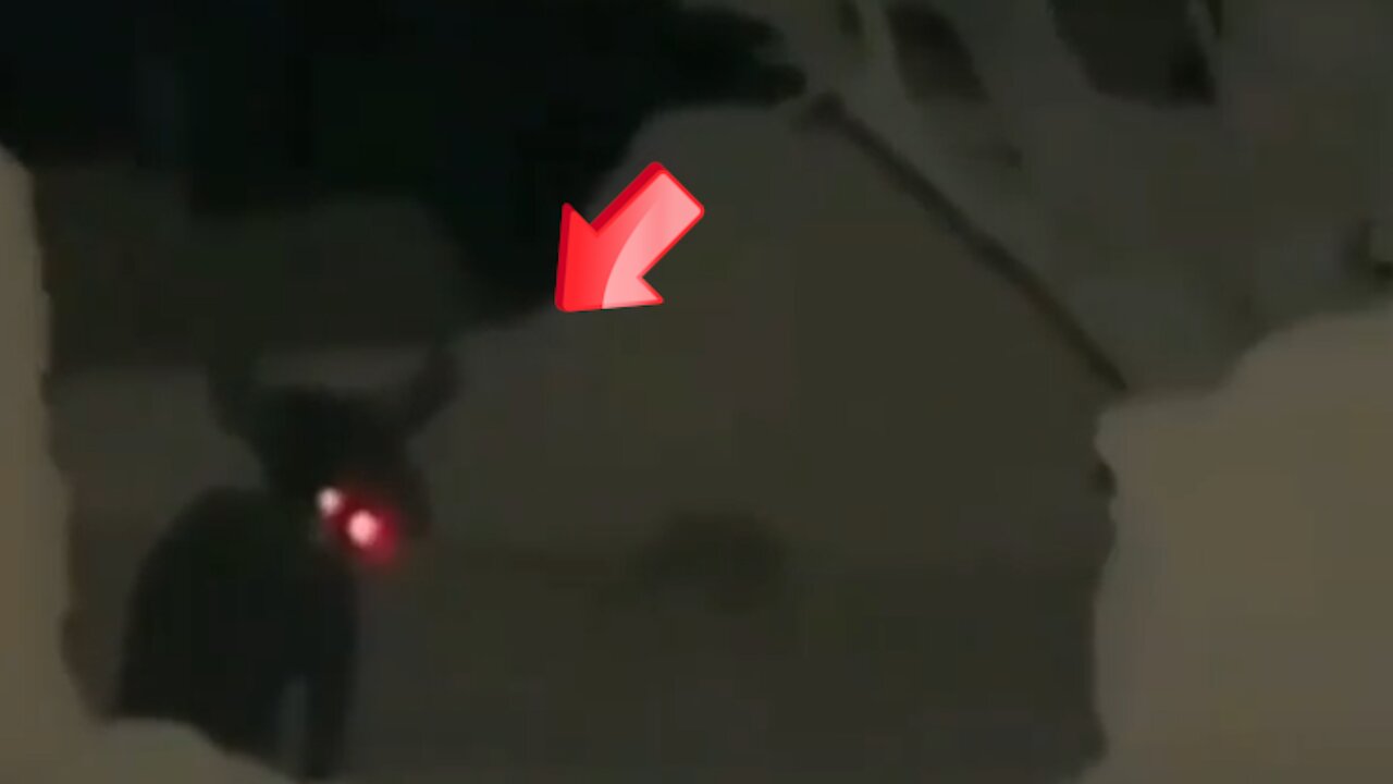 A mysterious creature with a black shadow and glowing red eyes in a snowy place [Space]
