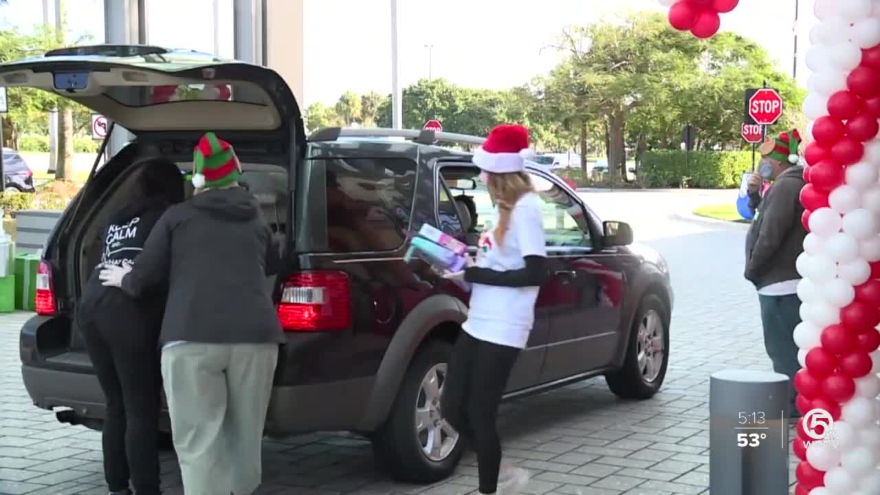 Volunteers with Boca Helping Hands serve Christmas Day feast