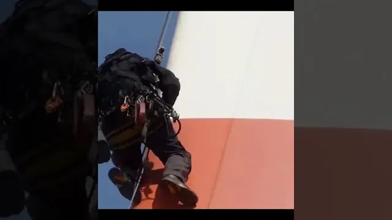 Watch That Guy Climbing and Crawling a Wind Turbine Over 300 Feet