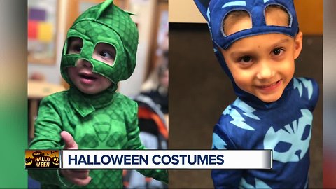 Roman and Zane show off their Halloween costumes