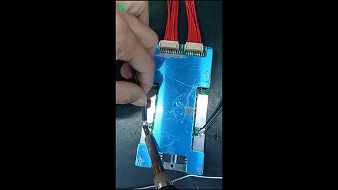 The soldering of wires in the Battery Management System (BMS).