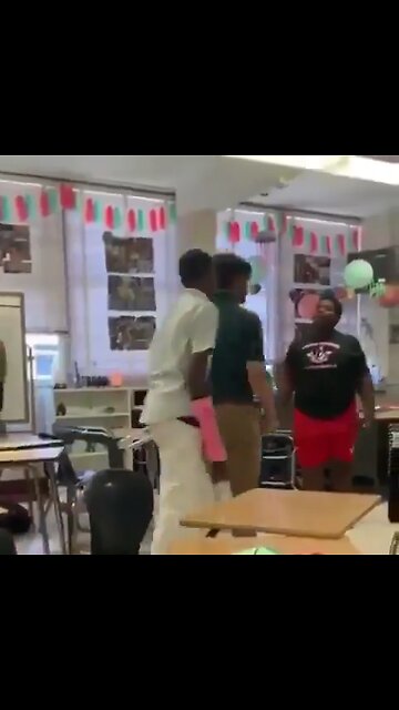 Teacher Aggressively Stops Students from Fighting