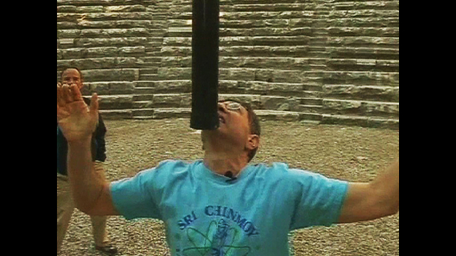 Man Balances 16-Meter Pole On Chin