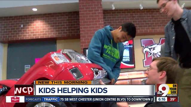 Milford highschoolers create vehicle for girls with muscle condition