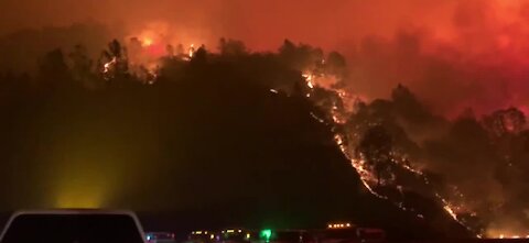 CA wildfires kill at least 10 people, with a dozen missing