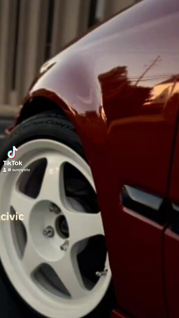 Cherry red Honda Civic.