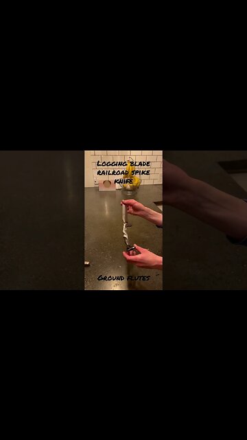 Logging blade railroad spike handle fluted