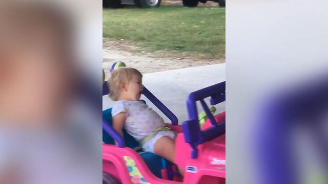 Tired Tot Drives Toy Car A Lot