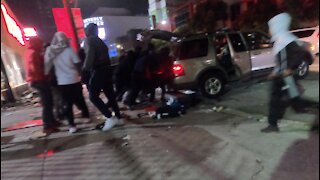 LOOTING: ATM extracted from a vandalized BevMo! store (followed by gunshot)
