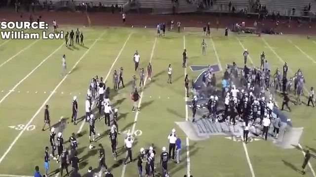 Police pepper spray crowd during fight after high school football game