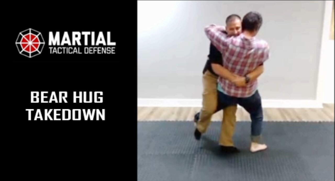 Bear hug trip takedown pin