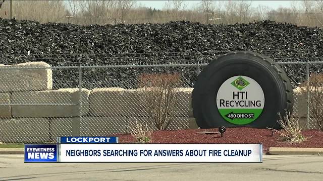 Neighbors searching for answers about tire fire cleanup