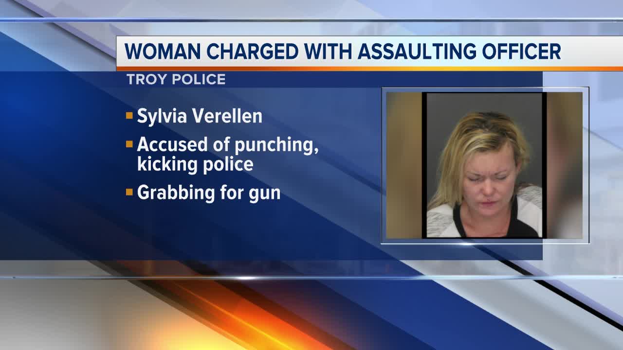 Woman allegedly assaults Troy cops, eats pair of earrings