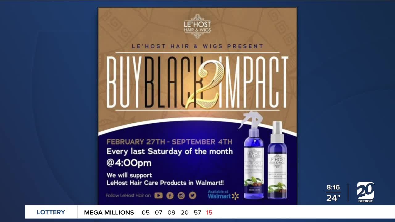 Local business owners holing Buy Black 2 Impact Our Community