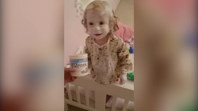 A Tot Girls Covers Herself In Diaper Rash Cream