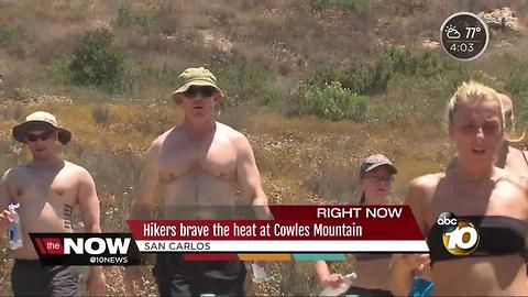 Hikers brave the heat at Cowles Mountain