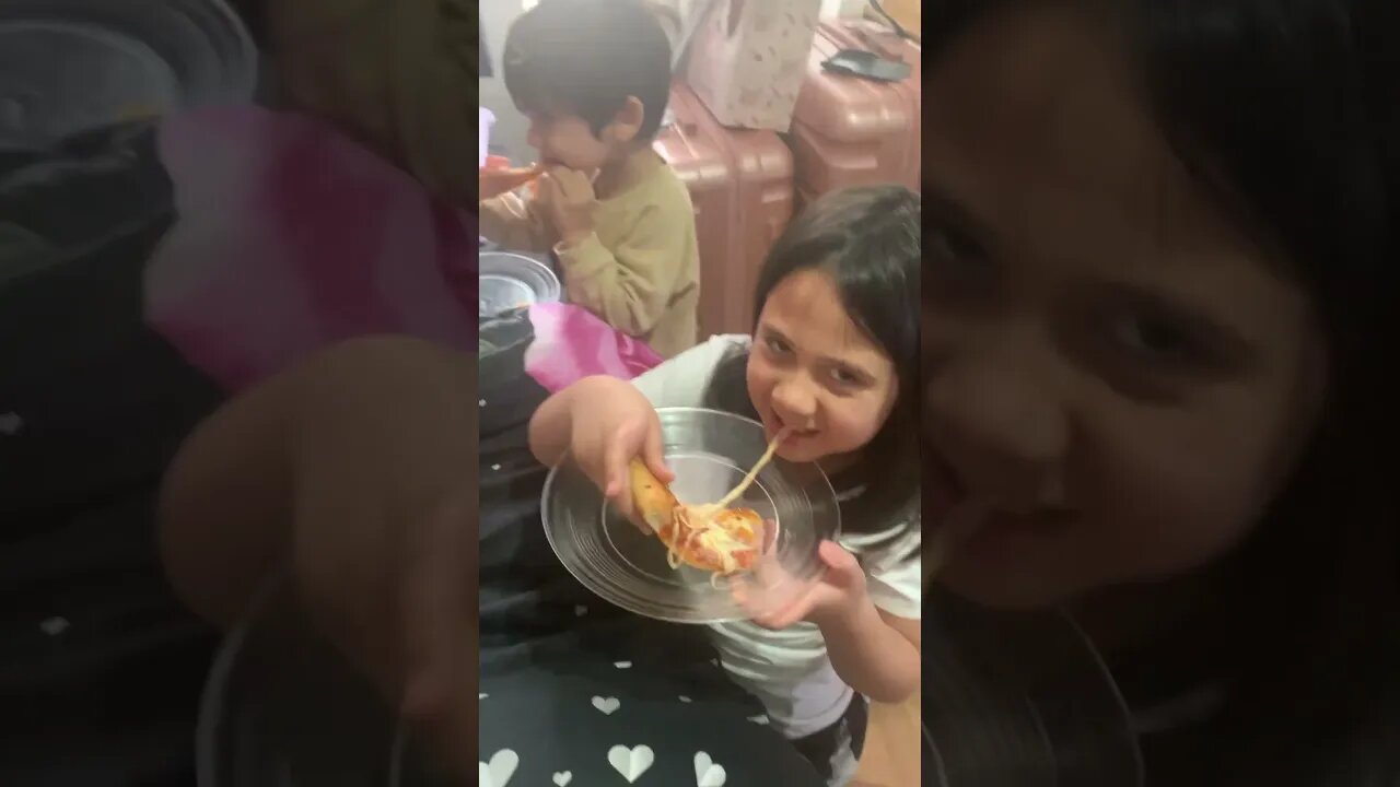 Simple happiness is this-eating pizza with those you love