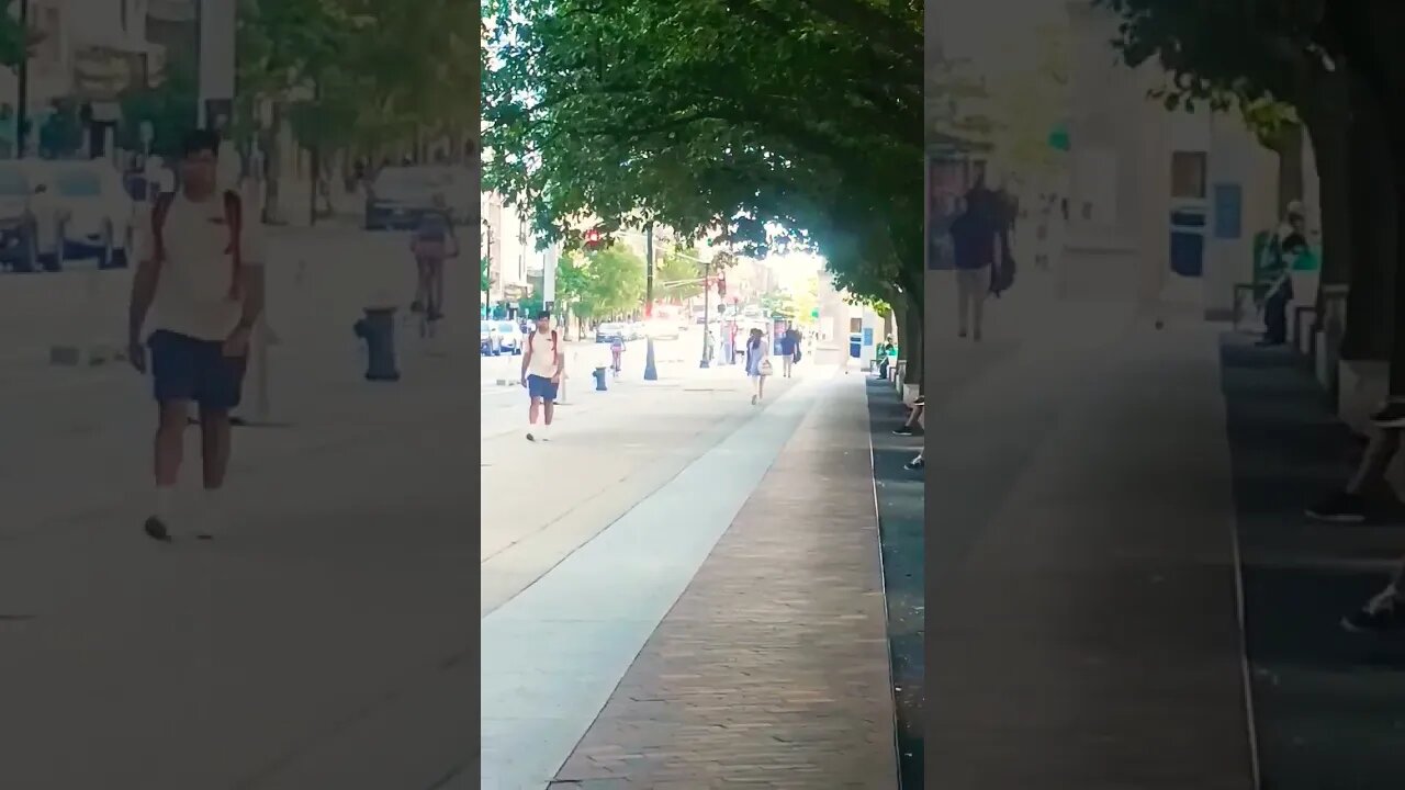 People Watching. Boston Massachusetts. Did I catch 2 AI robots or Humannoids?