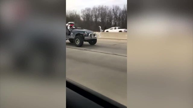 Santa caught cruising on I-70 in Jeep