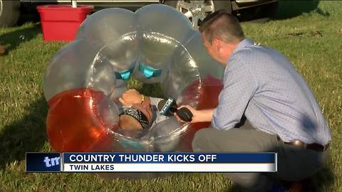 Campers sleep overnight for first day of Country Thunder