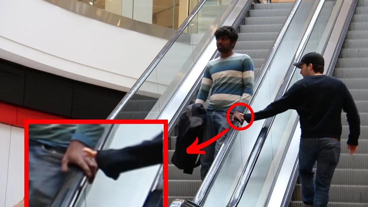 TINY HAND TOUCHING ON THE ESCALATOR PRANK!