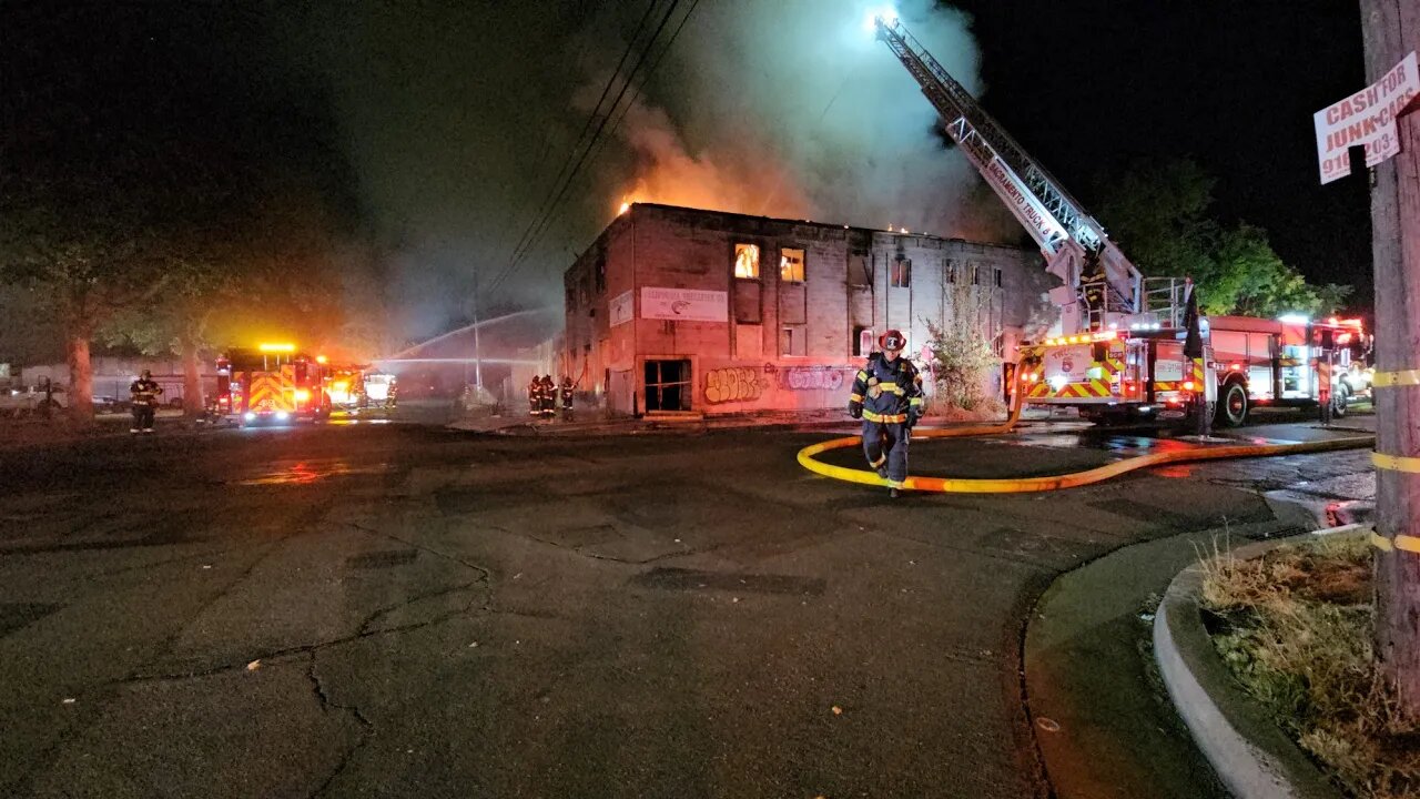 FIRE CREWS BATTLE INTENSE BLAZE AT ABANDONED FACTORY/WAREHOUSE