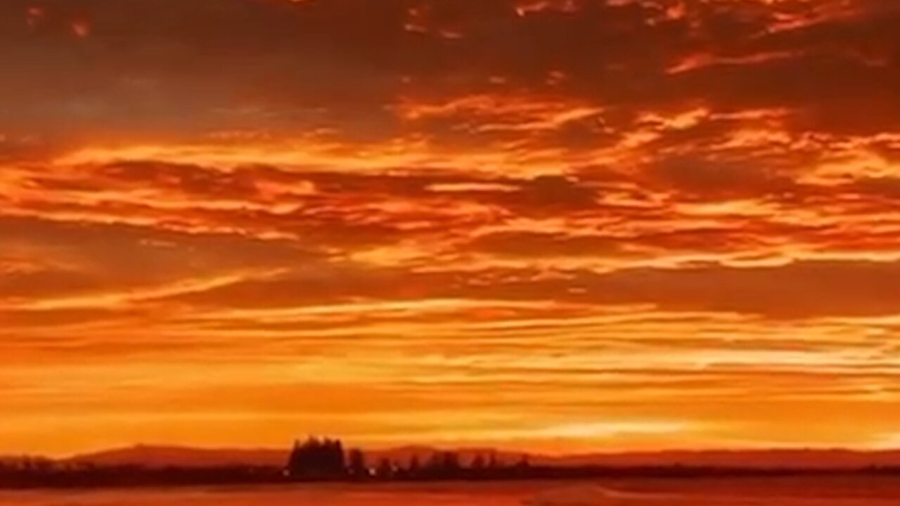 Surfer and Sunset Cloud