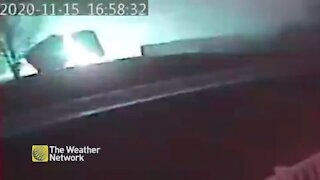 On camera: Roof torn off by winds flies into power lines