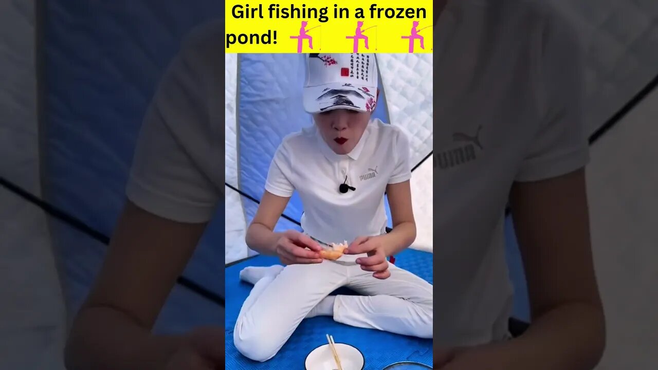 Girl fishing in a frozen pond