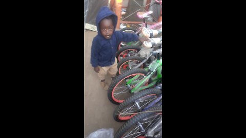 3 years old baby asking the price of bycycle in English language