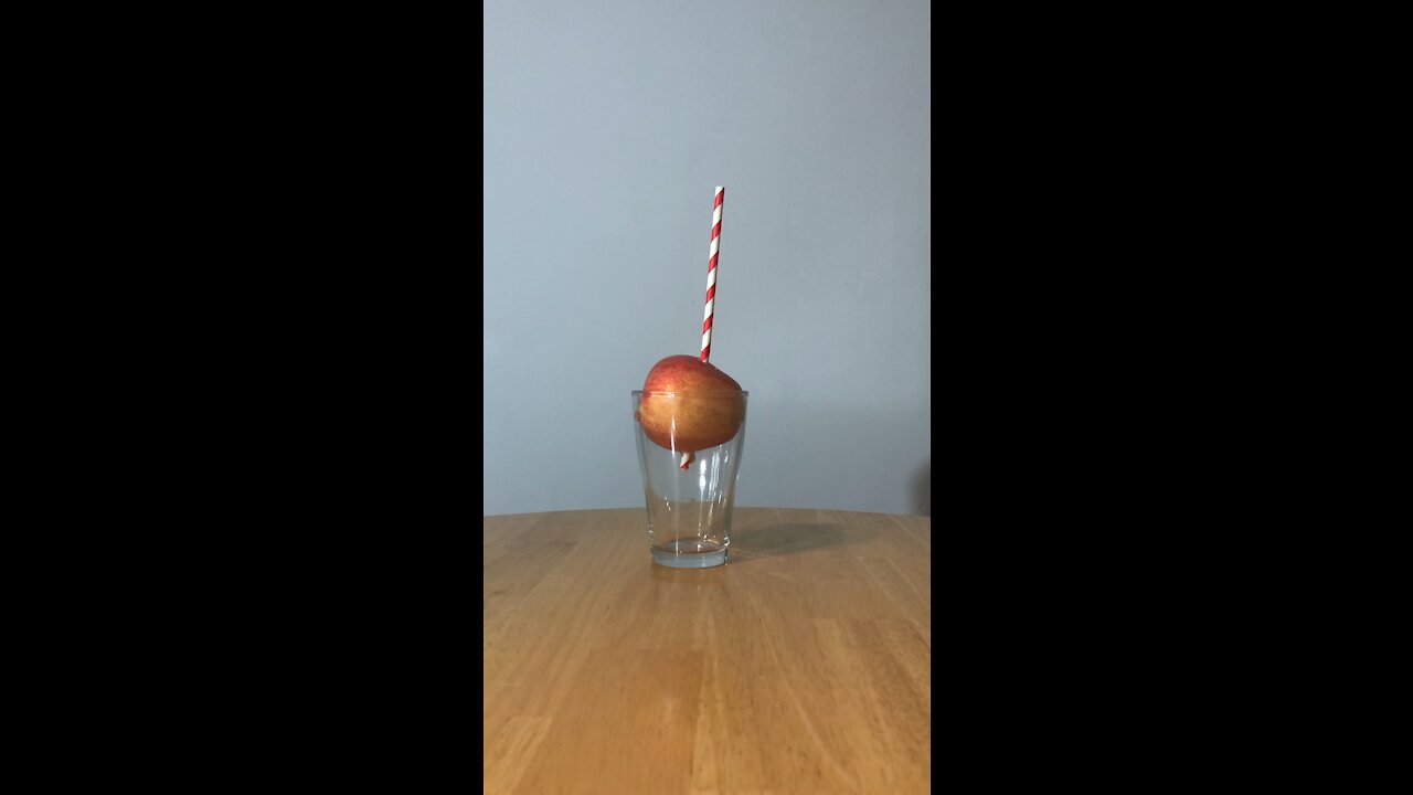 Putting A Straw Through An Apple