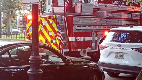 Boston fire department respond to overheated light fixture at 375 Comm Ave