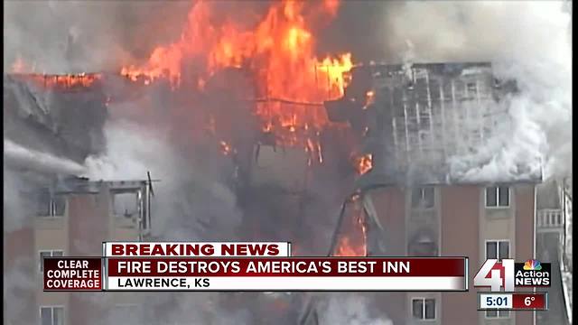 Lawrence fire crews battle motel fire