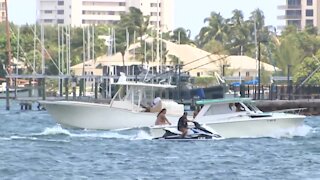 Lots of boats take part in 'Floatopia' around Peanut Island