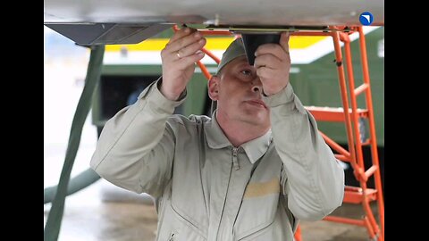 Sergey Bogdan performs routine pre-flight checks and preparations on his Sukhoi Su-57 before the...
