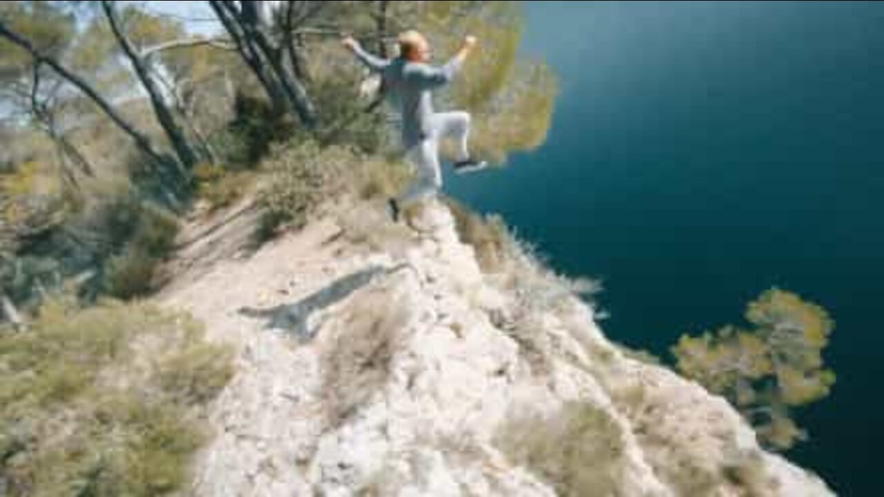 Epic cliff jumping captured by drone