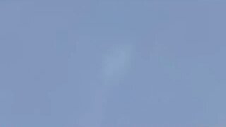 object flies thru clouds with three flashes going off around it