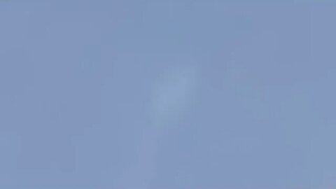 object flies thru clouds with three flashes going off around it